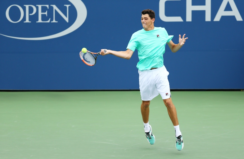 NEW YORK, NY - SEPTEMBER 13: Taylor Fritz of the United States returns a shot to Tommy Paul of the United States during their Junior Boys' Singles Final match on Day Fourteen of the 2015 US Open at the USTA Billie Jean King National Tennis Center on September 13, 2015 in the Flushing neighborhood of the Queens borough of New York City. Maddie Meyer/Getty Images/AFP